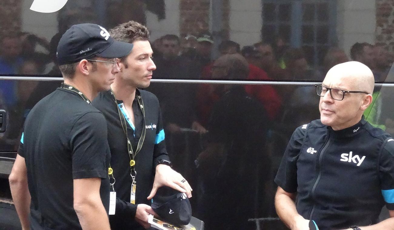 Dave Brailsford with two Team Sky coaches at the 2014 Tour de France